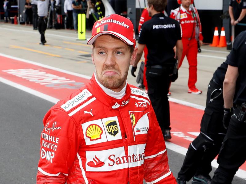 Der deutsche Ferrari-Pilot Sebastian Vettel hadert mit seinem Qualifikationsergebnis in Silverstone Der deutsche Ferrari-Pilot Sebastian Vettel hadert mit seinem Qualifikationsergebnis in Silverstone