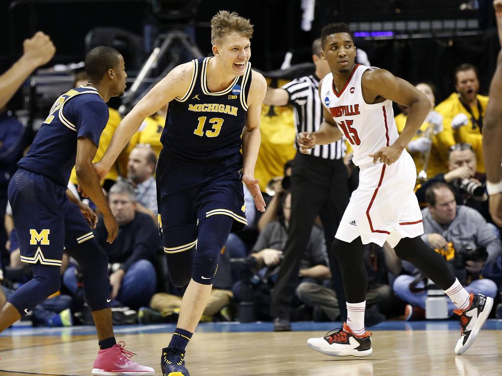 Moritz Wagner (Nummer 13) spielt im College-Basketball eine tragende Rolle Moritz Wagner (Nummer 13) spielt im College-Basketball eine tragende Rolle