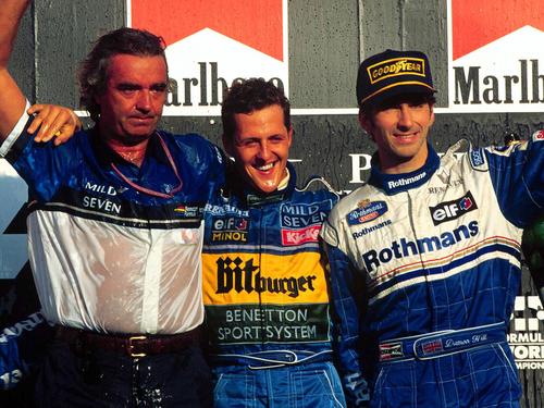 Benetton-Erfolgsduo: Teamchef Flavio Briatore (l.) und Michael Schumacher (M.)